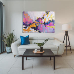 Abstract canvas art with vibrant pinks, purples, and gold, in a modern living room setting.