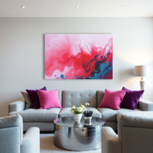 A living room with a gray sofa and a canvas print featuring a fluid abstract design with red, pink, and blue hues.