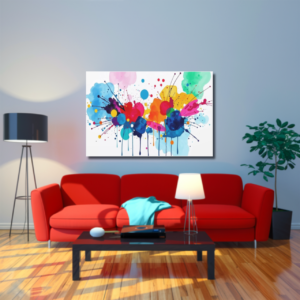 A living room with a red sofa and a canvas print featuring an abstract splatter design with vibrant blue, pink, yellow, orange, and green colors.