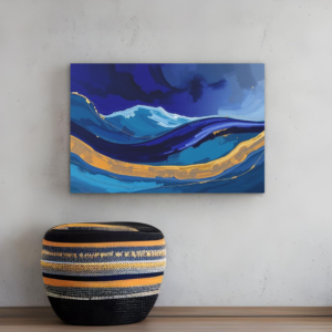 A wall with a canvas print featuring abstract blue ocean waves with a golden path and a woven stool below.