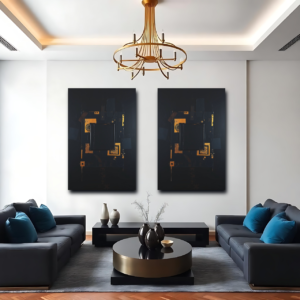 A living room with gray sofas and two canvas prints featuring black backgrounds with metallic accents in an industrial style.
