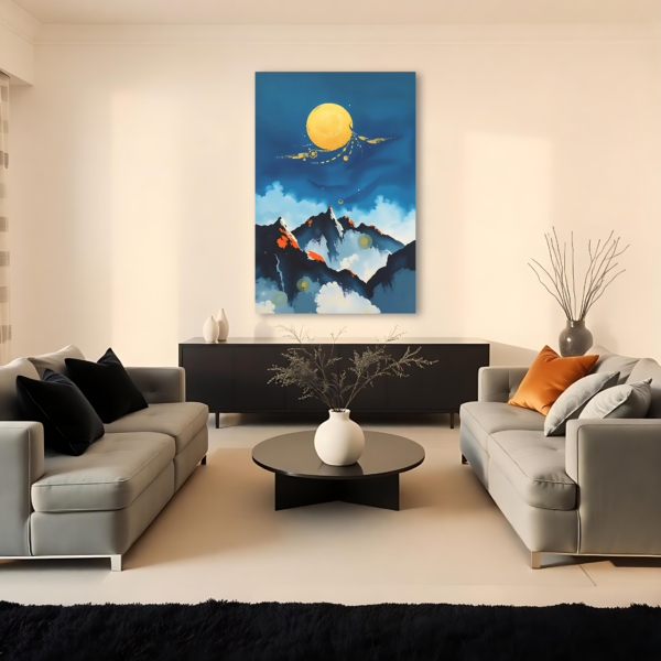 A living room with gray sofas and a canvas print featuring a mountain landscape with a yellow sun and blue tones.
